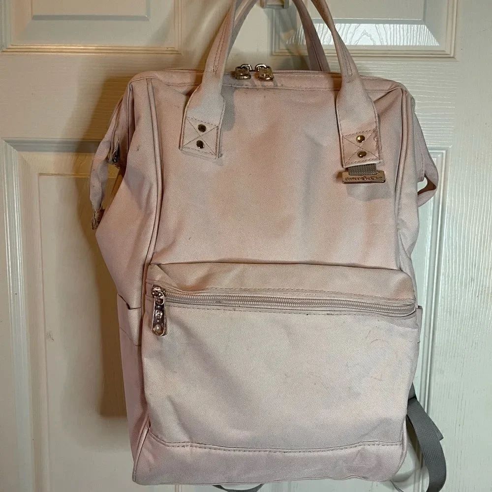 Swiss Gear light pink canvas multi purpose backpack with Rose gold Hardw…